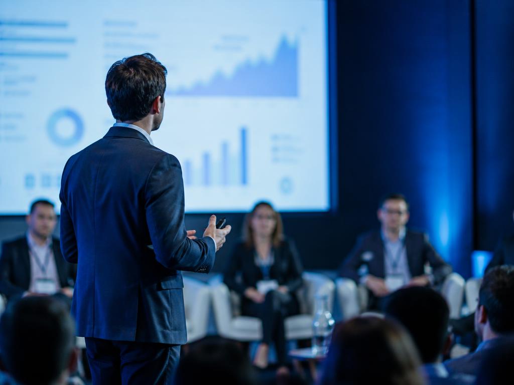 Founder pitching to investors at a pitch competition